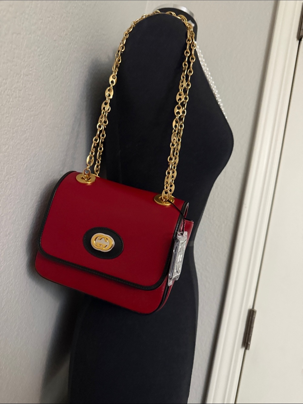 Gucci Red Shoulder Bag with Gold Chain and Black Trim Accent